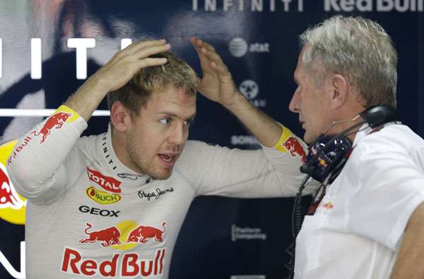 Sebastian Vettel jokes with Helmut Marko in the back of the garage, Indian Grand Prix, Greater Noida, October 25, 2013 © Getty 